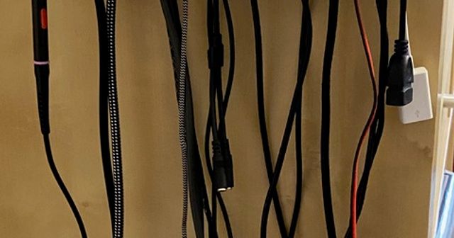 Organizador de cables de pared